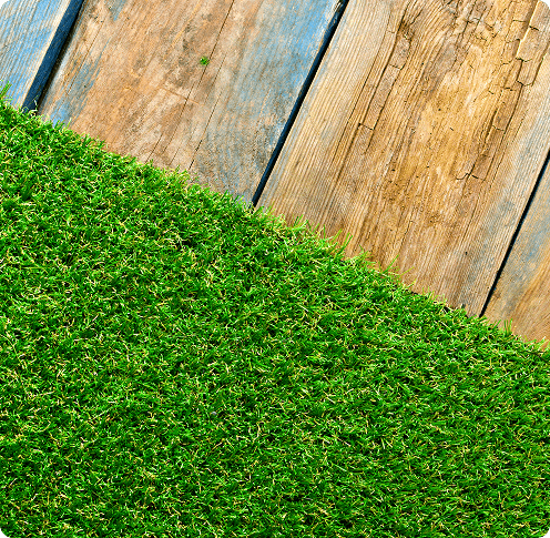 a close up of synthetic turf and decking