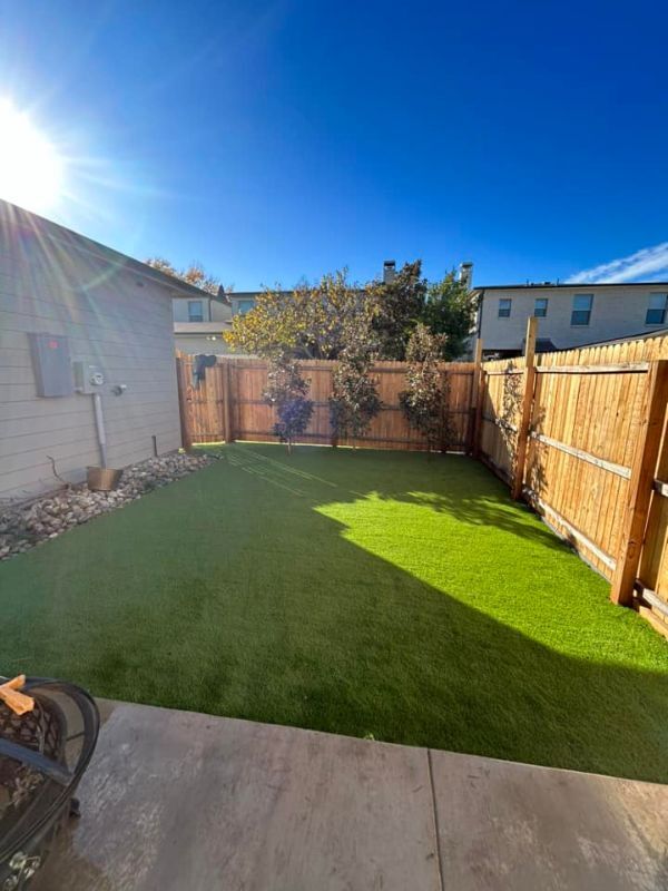 Artificial turf was installed in a backyard.