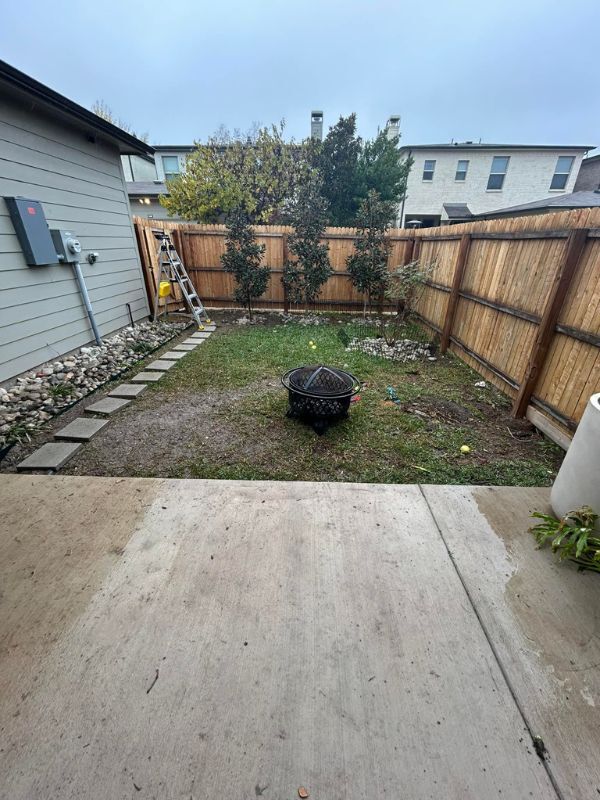 Before the artificial turf was installed in the backyard.